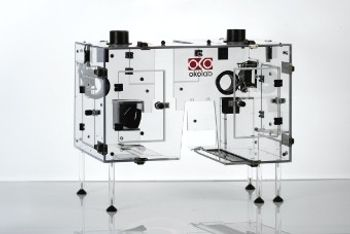 A Whole-Microscope Enclosure for Maintaining Cell Culture Conditions